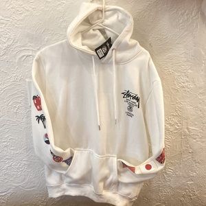 Stussy world tour white hoodie. NWT. Men’s size Large. Logos on sleeves.